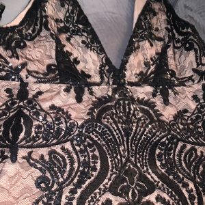 Free people later lace and sequin- nude and black.